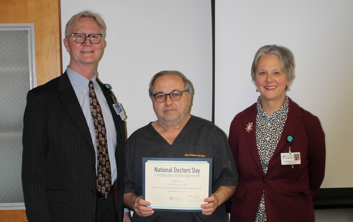 Shown L to R: Rodney Reider, CEO, Russell Dumire, MD, Elizabeth Dunmore, MD, CMO