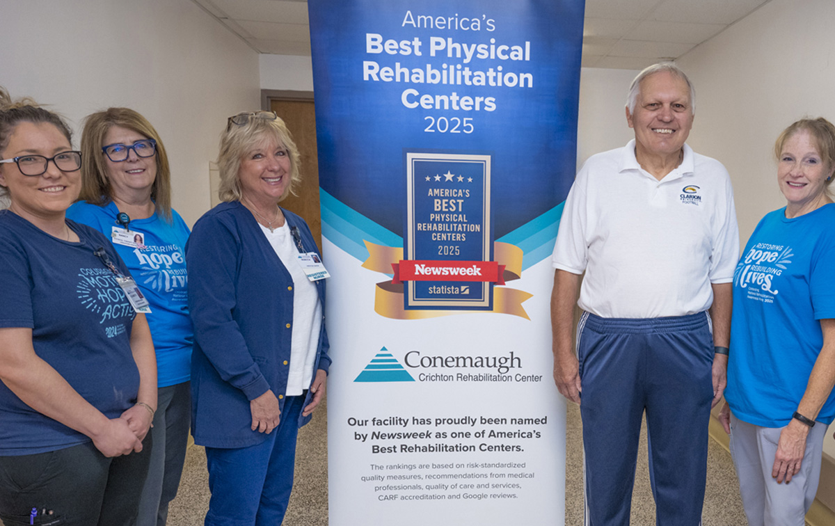 John Nakich with Crichton Rehabilitation Center staff